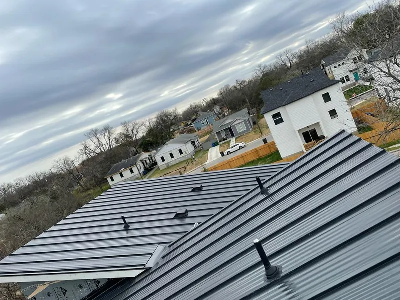 Standing seam metal roof panels with vents for Skylight Repair in Owasso